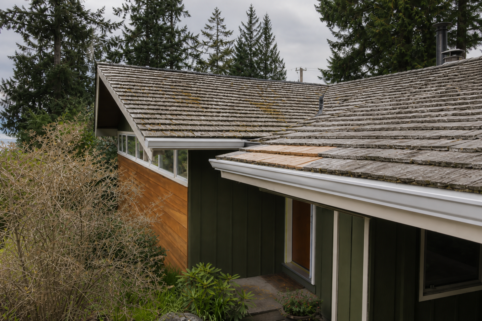 Matching eave or secondary detail after work on a roofing scenario typical of West Vancouver mid-century homes