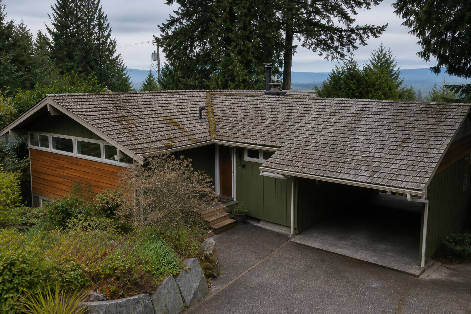 Alternate angle of the failure before work on a roofing scenario typical of West Vancouver mid-century homes