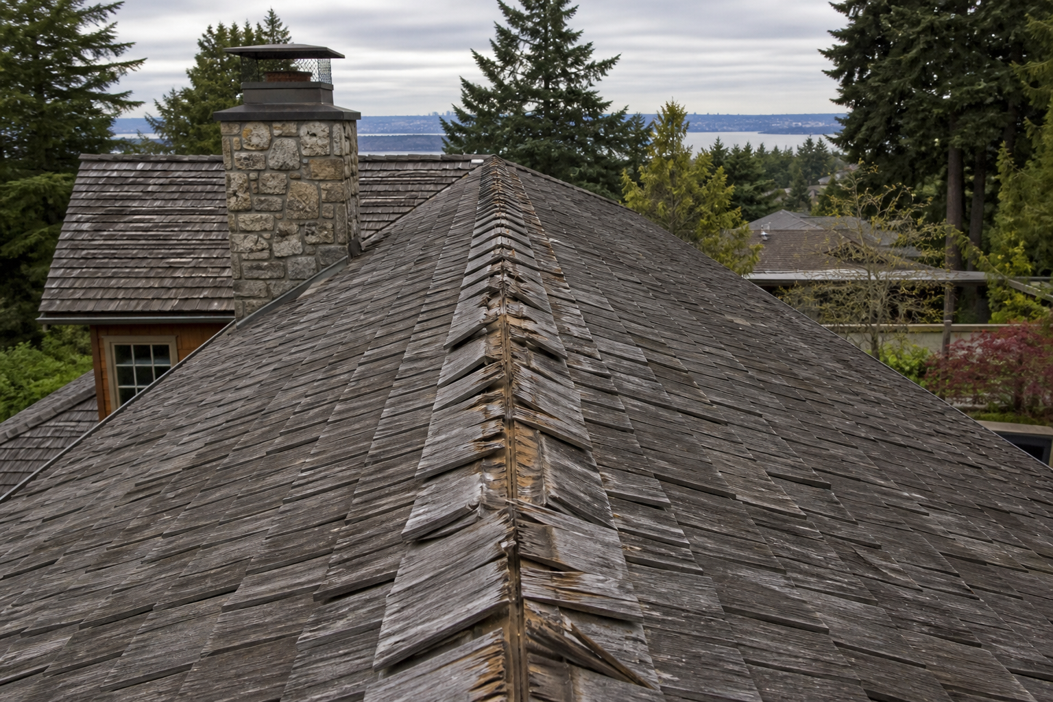 Alternate angle of the failure before work on a roofing scenario typical of West Vancouver craftsman homes