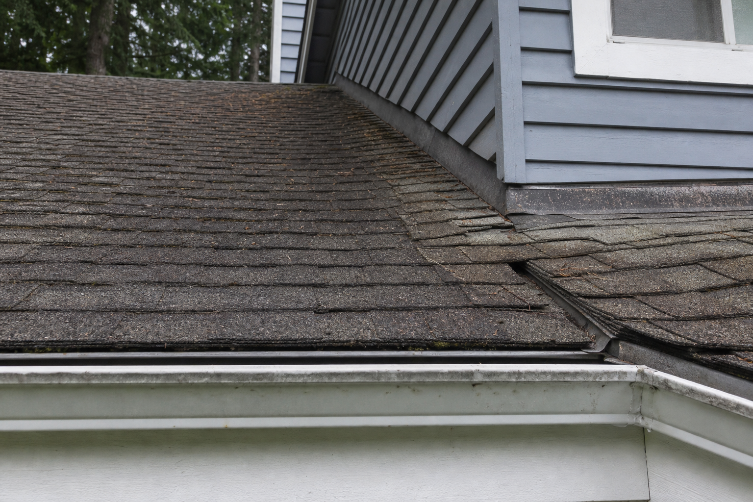 Tight technical failure detail before work on a roofing scenario typical of North Vancouver two-storey homes