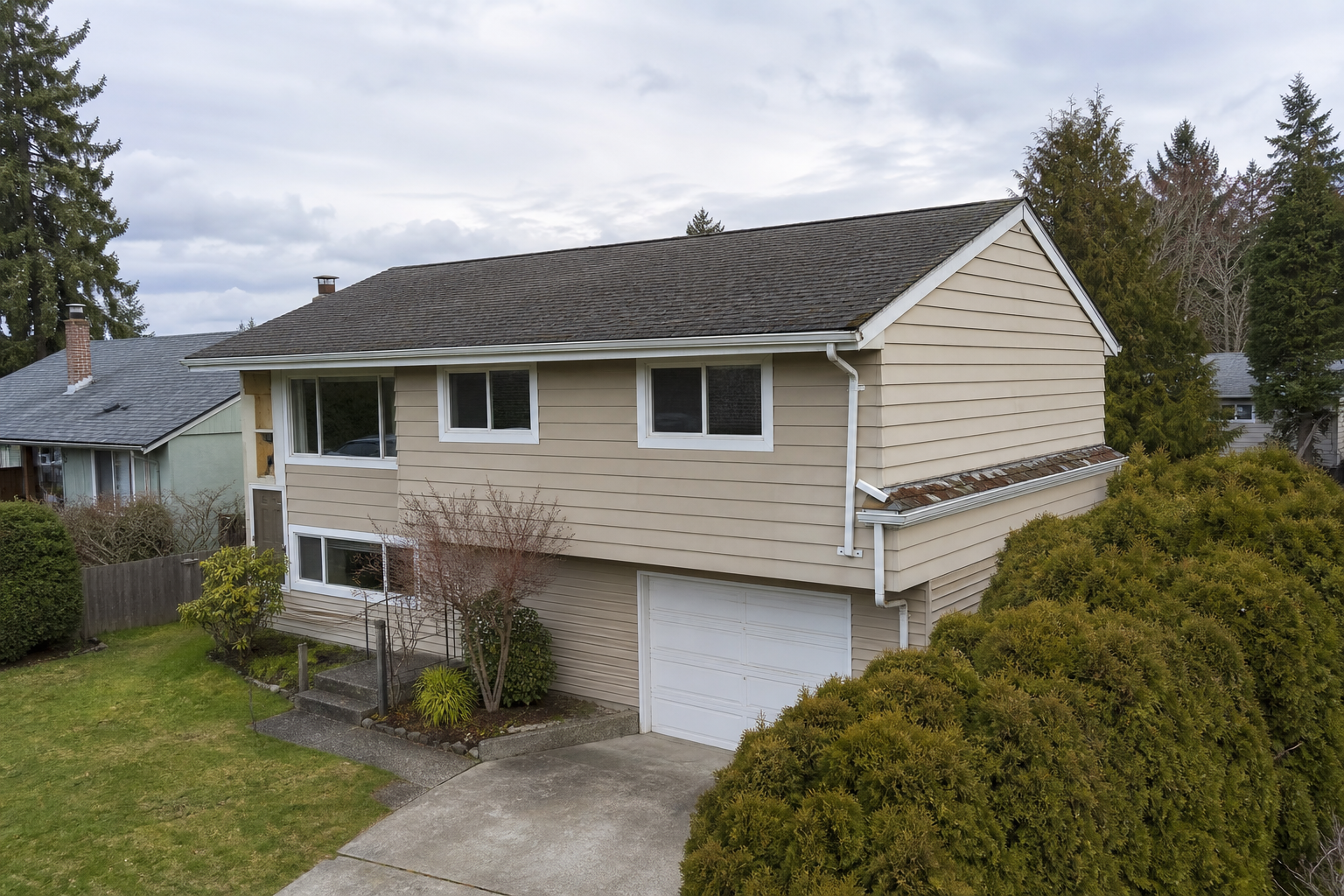 Establishing property view before work on a roofing scenario typical of Burnaby 1960s split-levels