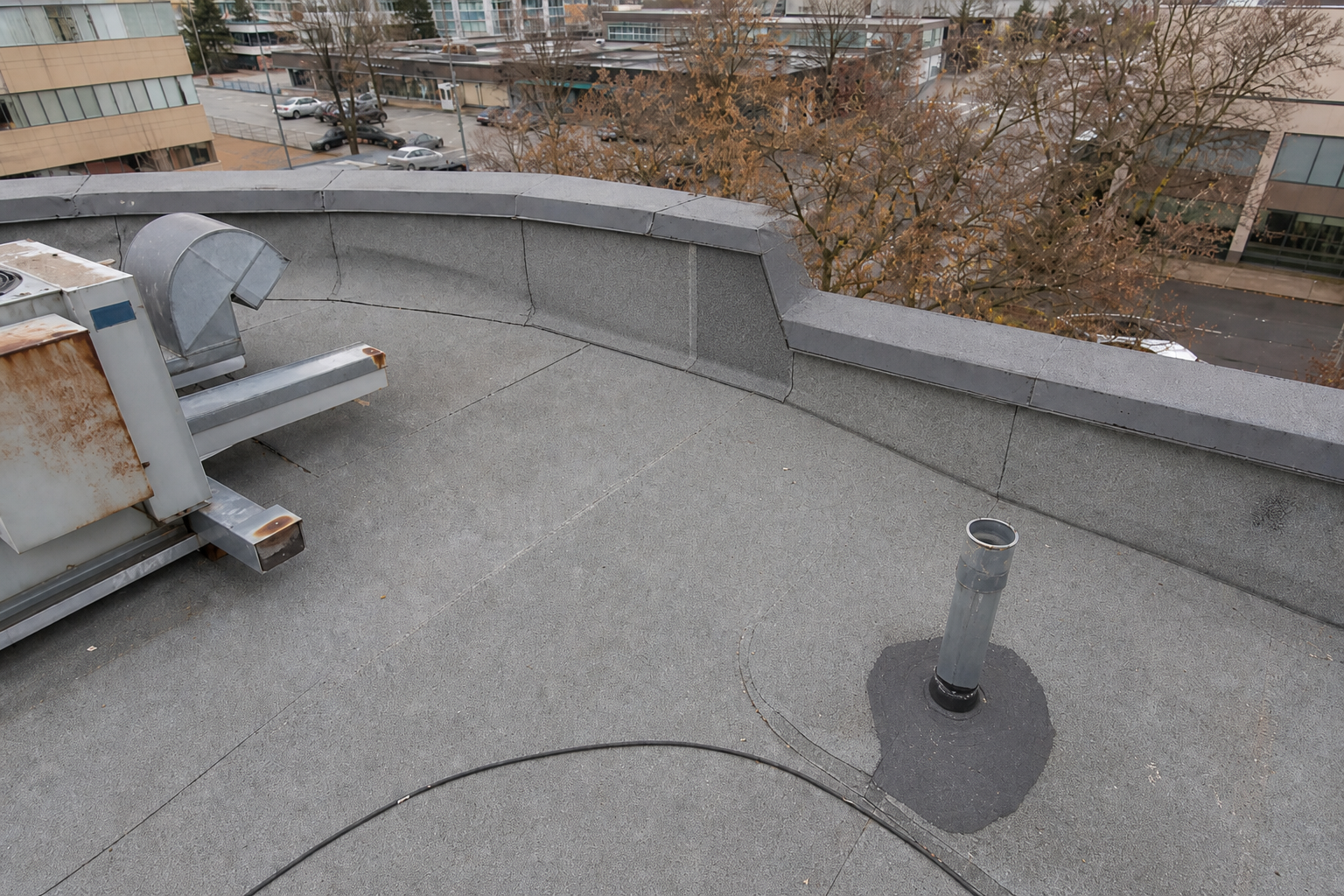 Matching technical detail after work on a roofing scenario typical of Burnaby commercial/strata roofs