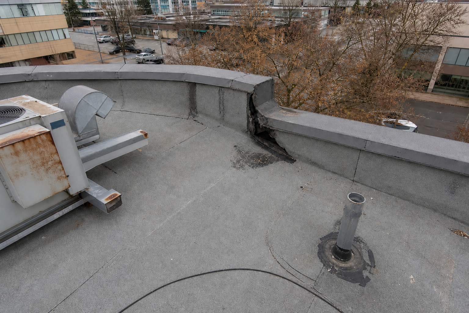 Alternate angle of the failure before work on a roofing scenario typical of Burnaby commercial/strata roofs