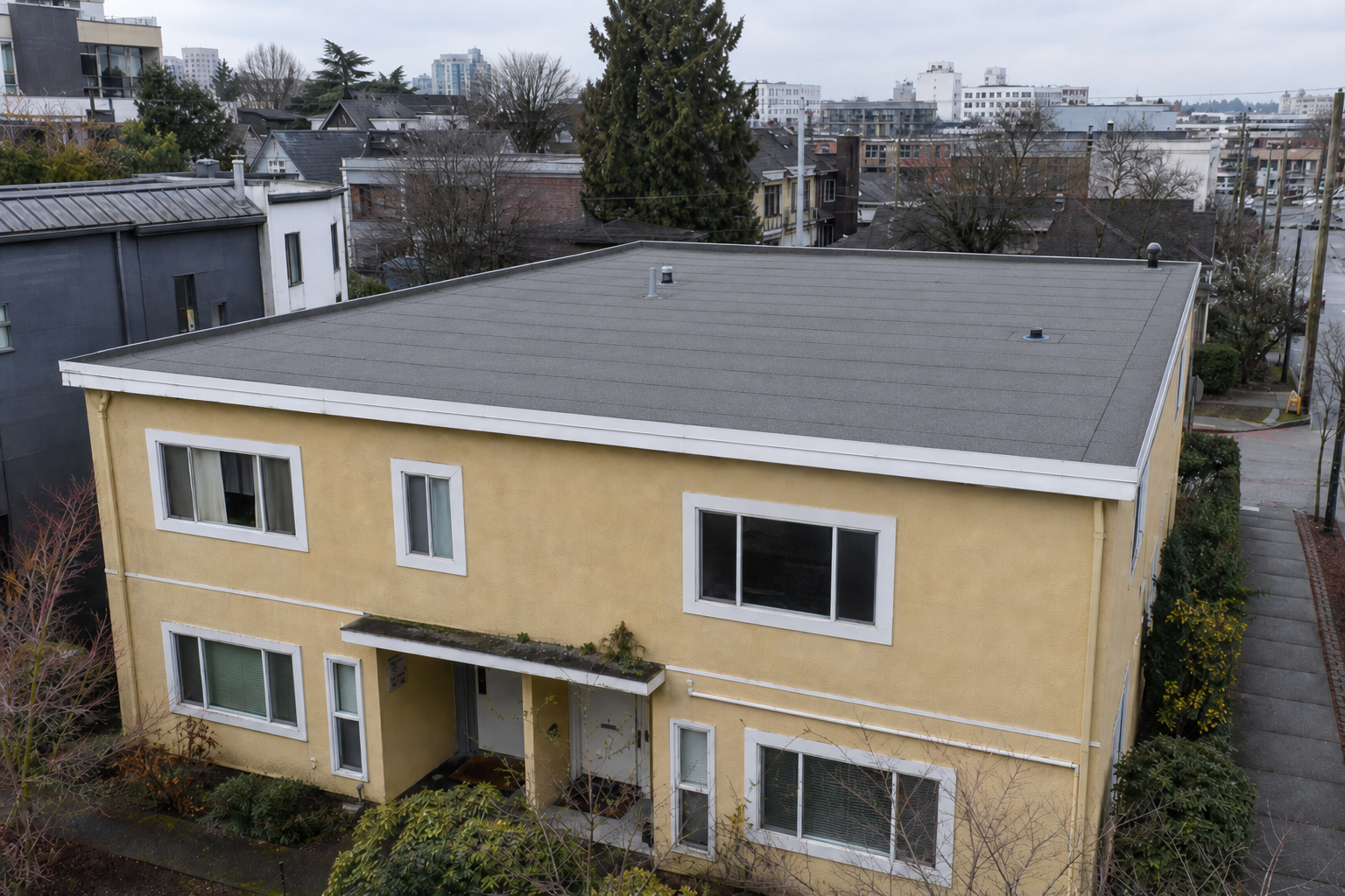 Establishing property view after work on a roofing scenario typical of Vancouver Mount Pleasant duplexes