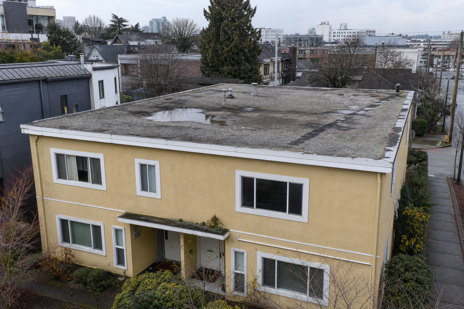 Establishing property view before work on a roofing scenario typical of Vancouver Mount Pleasant duplexes