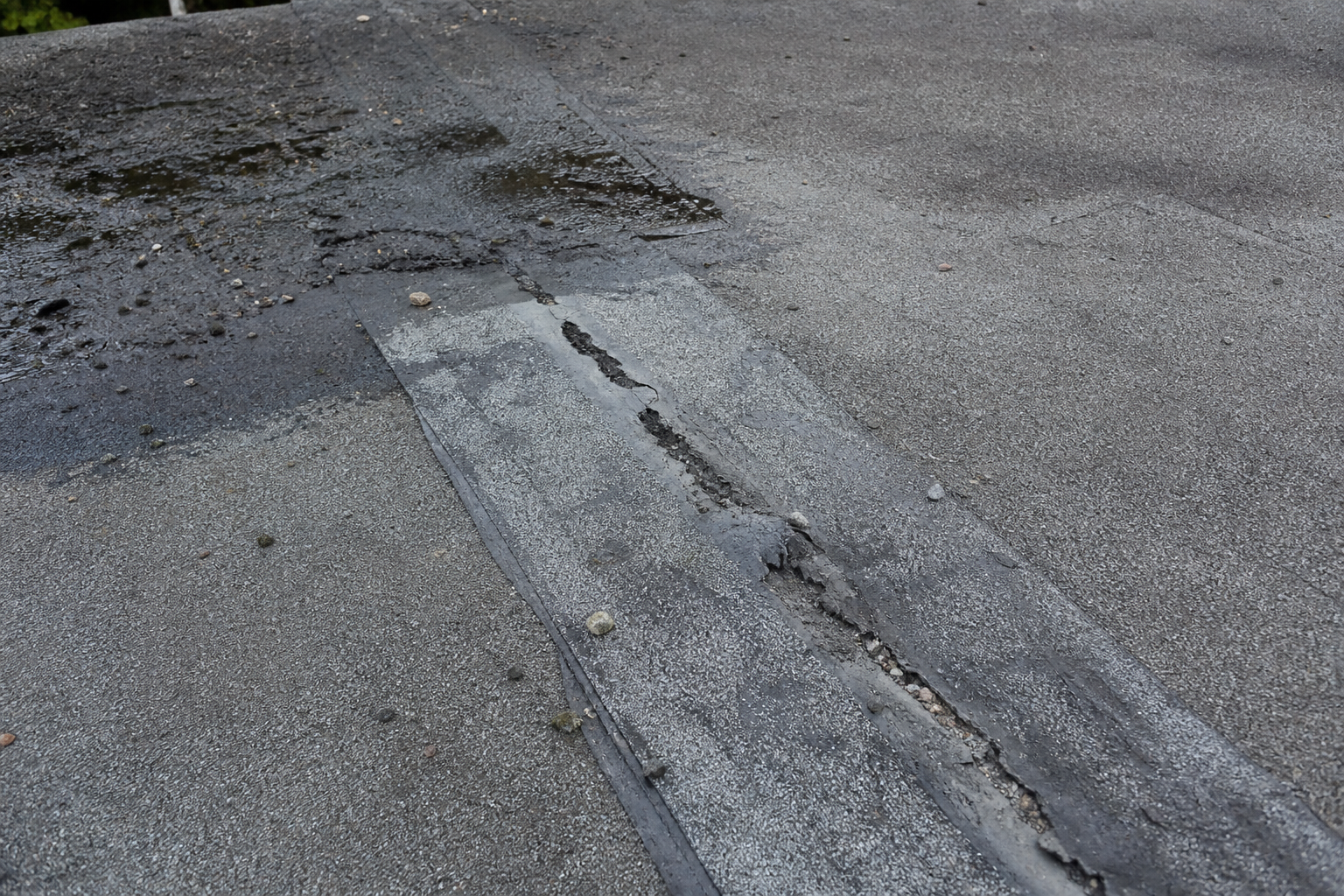 Primary problem-area detail before work on a roofing scenario typical of Vancouver Mount Pleasant duplexes