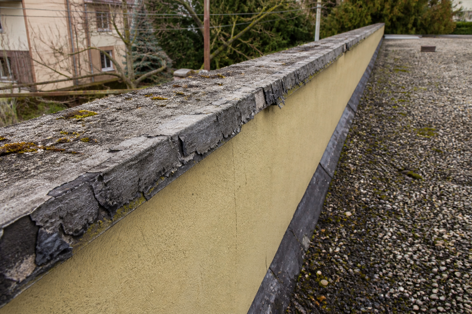 Alternate angle of the failure before work on a roofing scenario typical of Vancouver Mount Pleasant duplexes