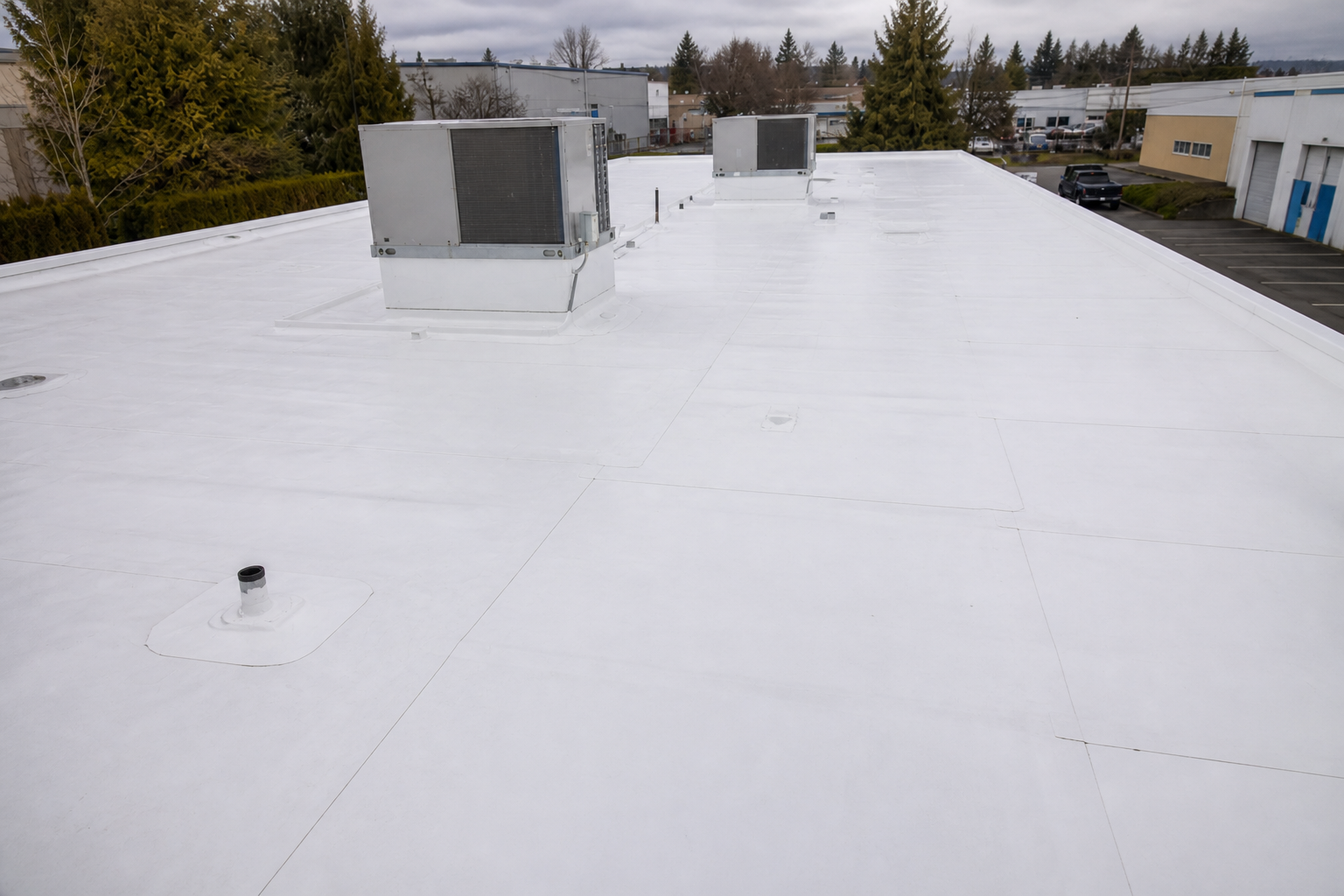 Matching eave or secondary detail after work on a roofing scenario typical of Richmond small commercial buildings