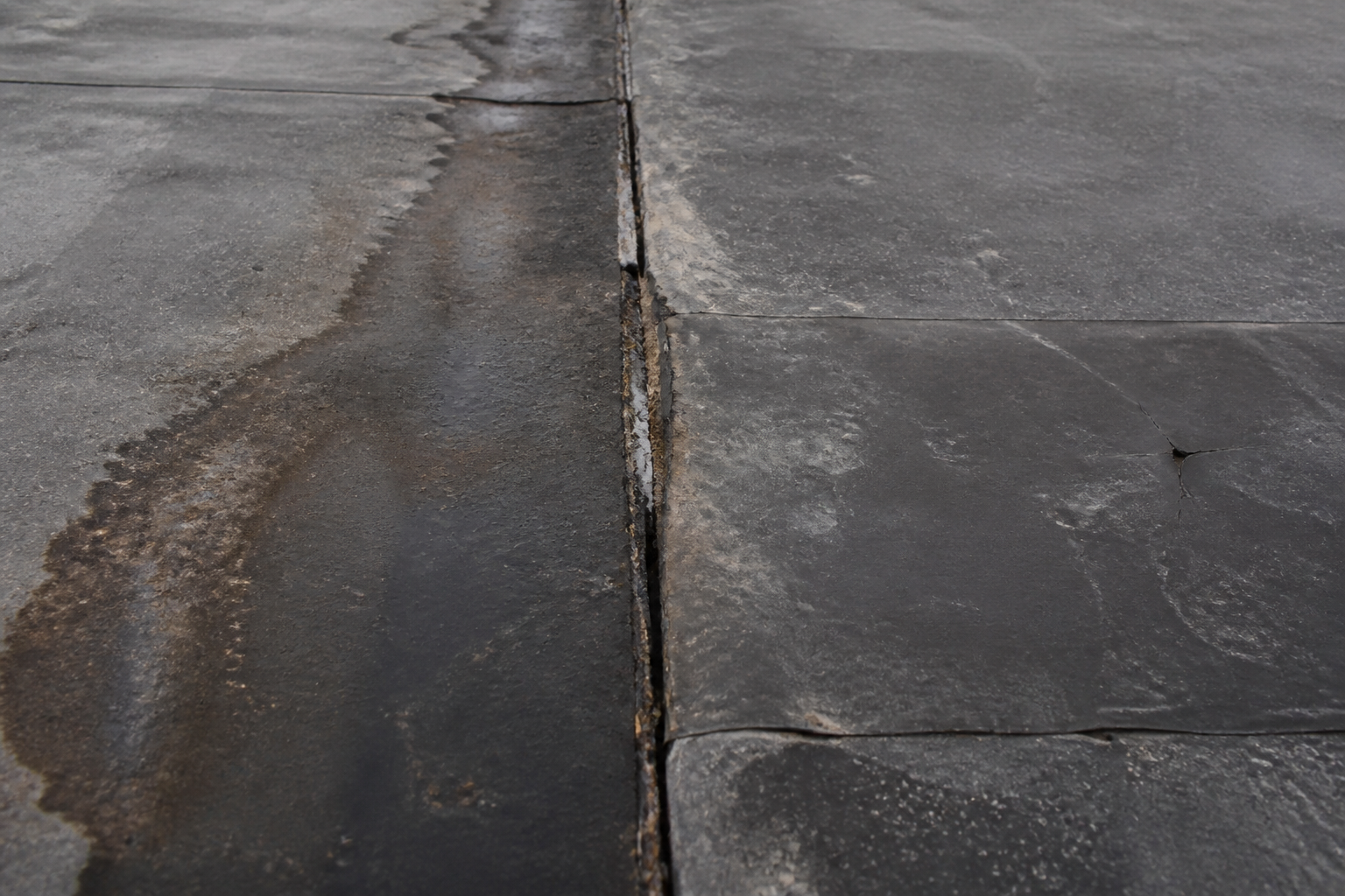 Tight technical failure detail before work on a roofing scenario typical of Richmond small commercial buildings