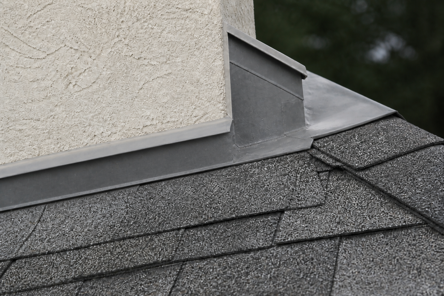 Matching eave or secondary detail after work on a roofing scenario typical of Langley cream-stucco homes
