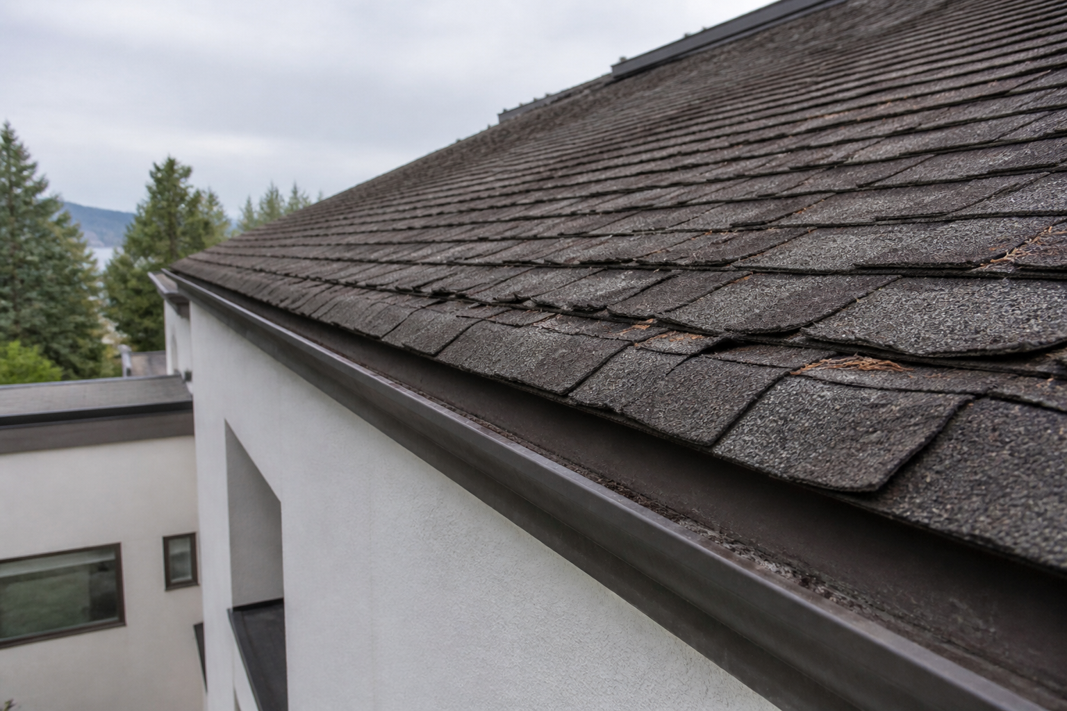 Primary problem-area detail before work on a roofing scenario typical of West Vancouver modern homes