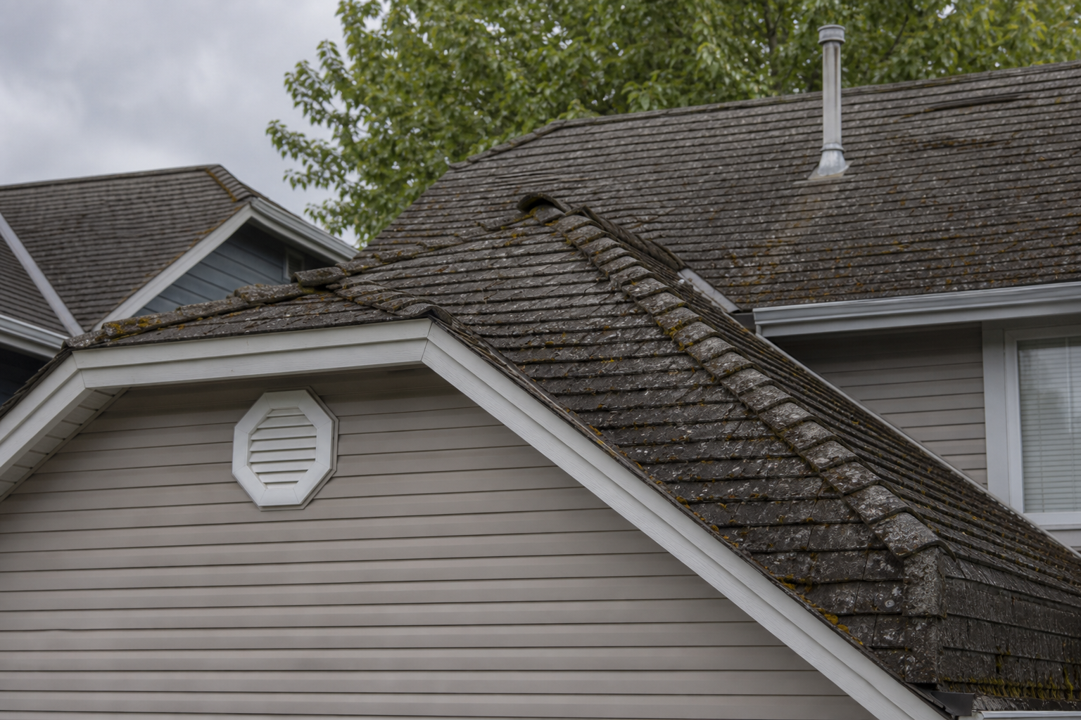 Alternate angle of the failure before work on a roofing scenario typical of Coquitlam family homes