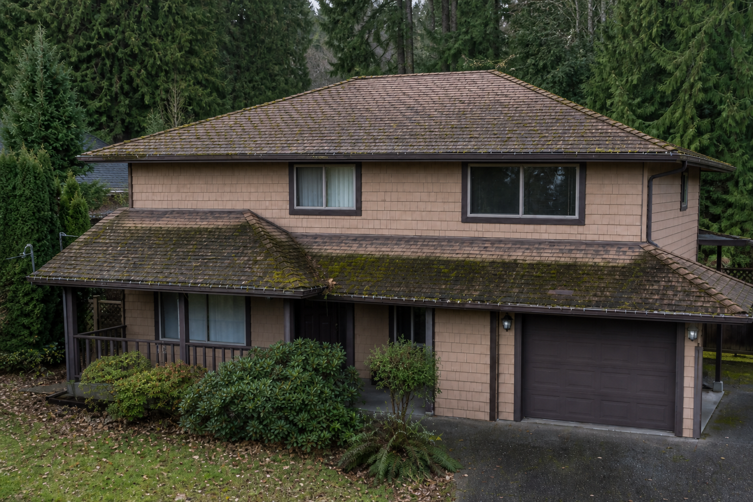 Alternate angle of the failure before work on a roofing scenario typical of Maple Ridge forest-edge homes