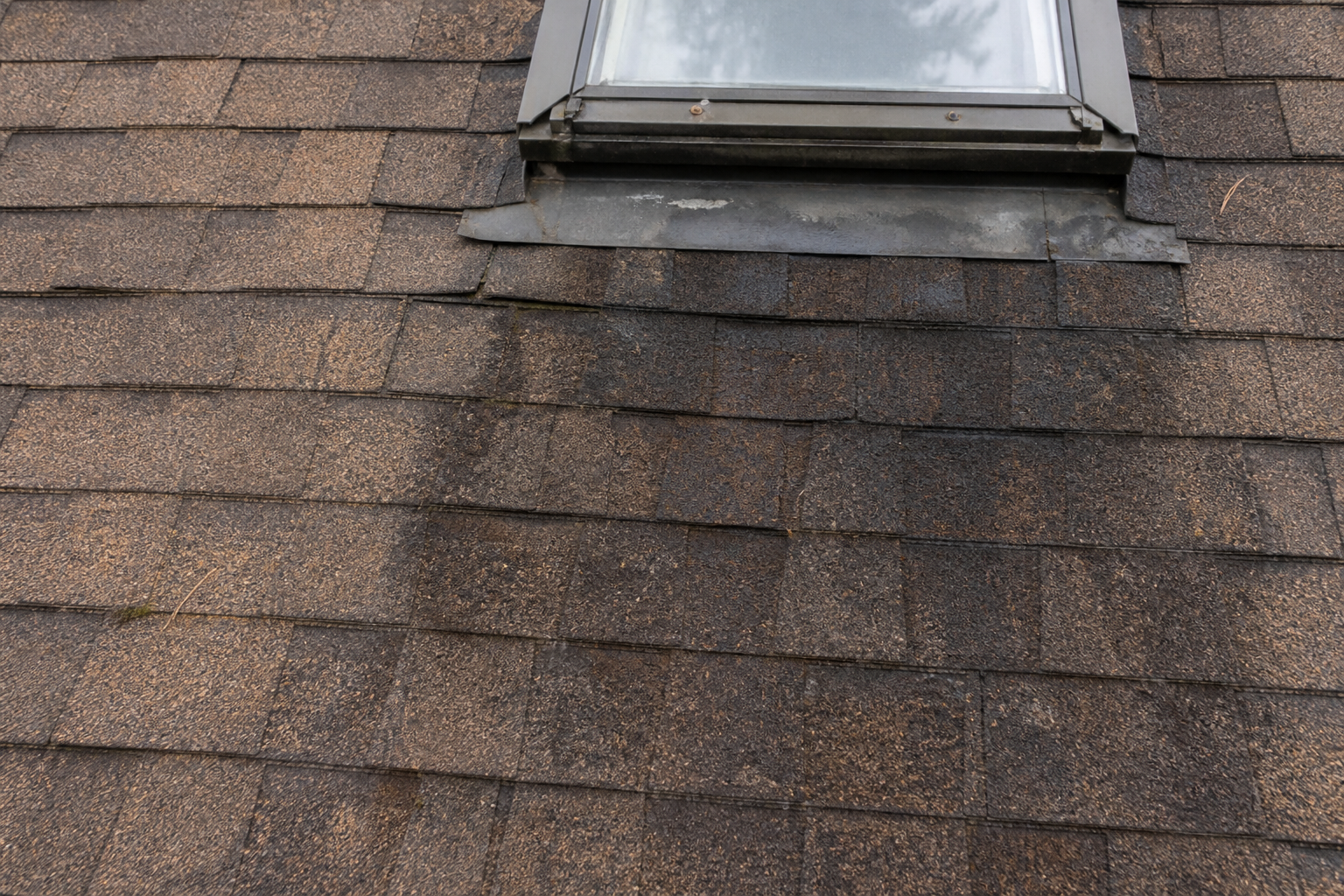 Eave, gutter, or secondary consequence detail before work on a roofing scenario typical of North Vancouver 1990s homes