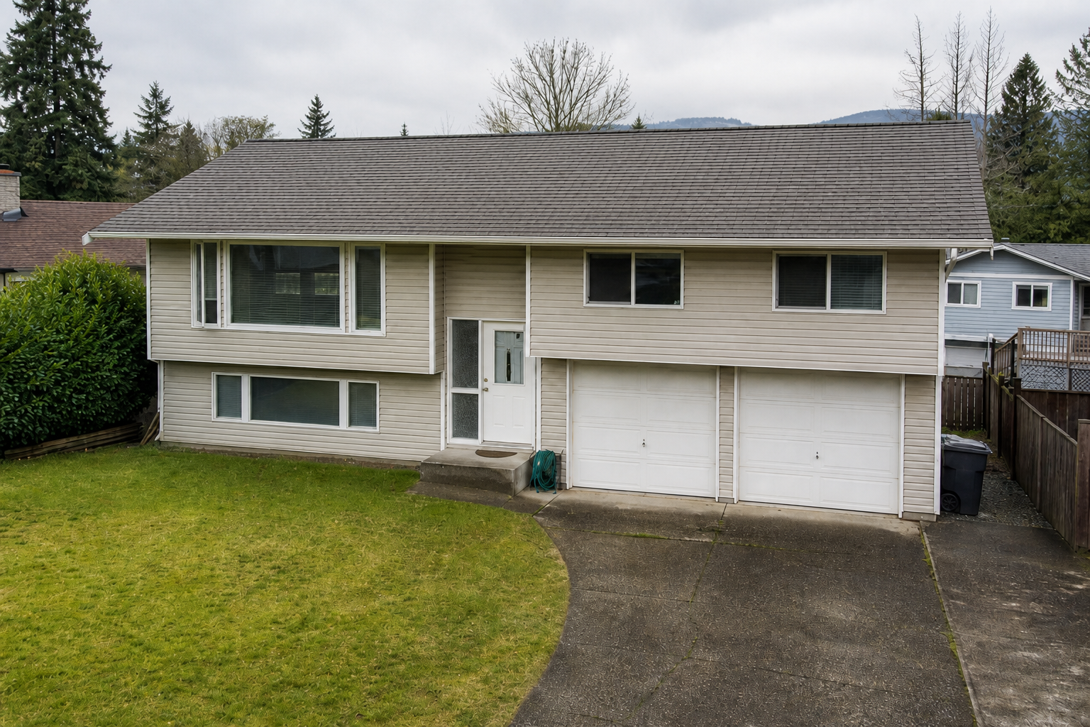 Establishing property view after work on a roofing scenario typical of Burnaby split-level homes