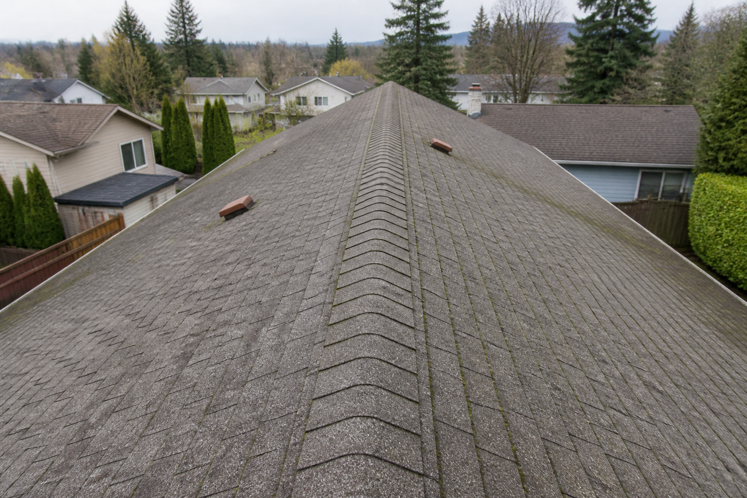 Alternate angle of the failure before work on a roofing scenario typical of Burnaby split-level homes