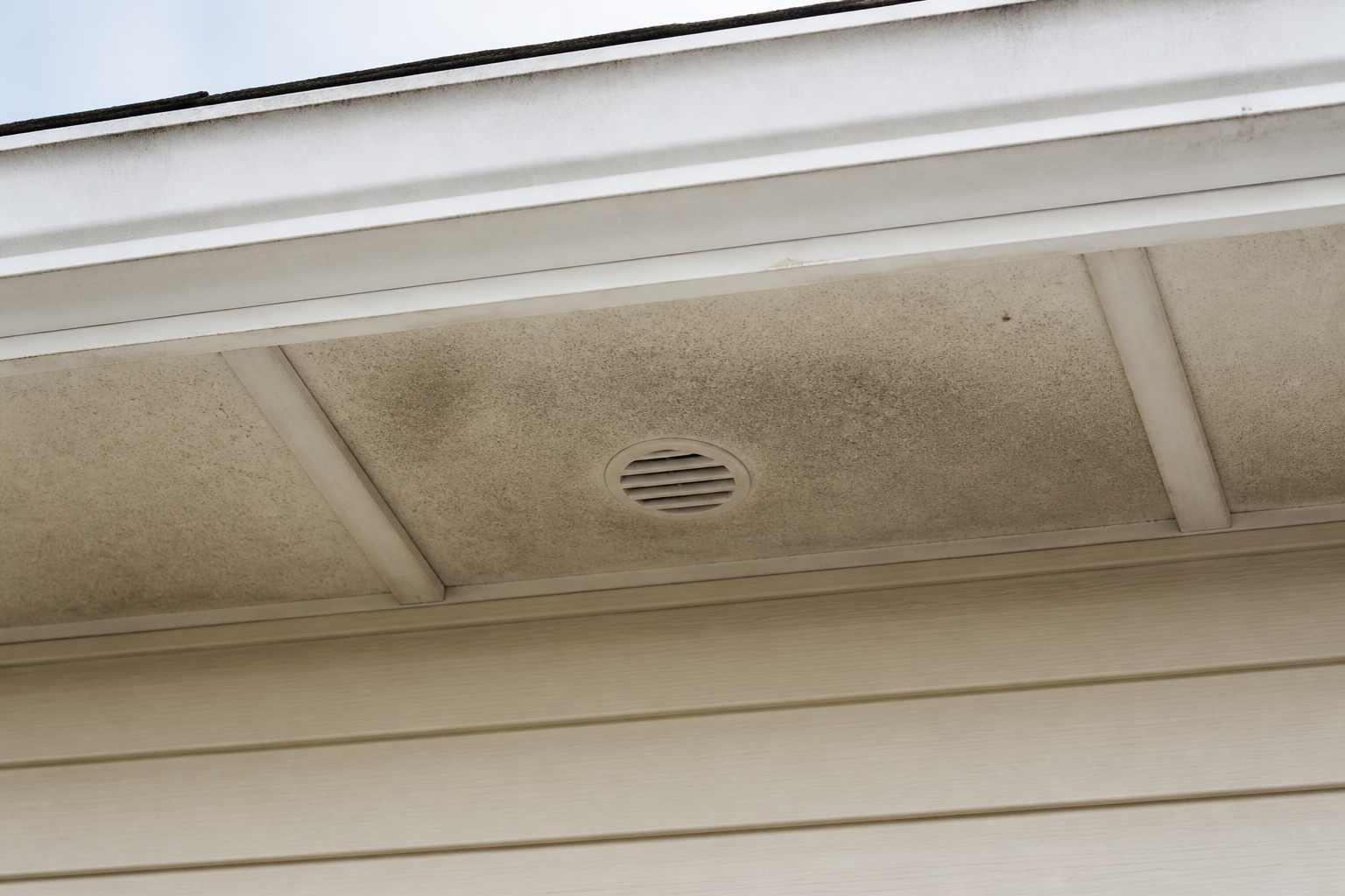 Eave, gutter, or secondary consequence detail before work on a roofing scenario typical of Burnaby split-level homes